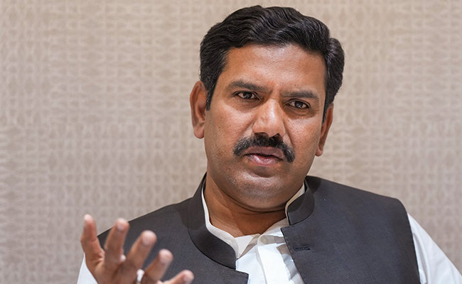 BJP slams Karnataka Cong govt's move to end tax exemption given to EV four-wheelers